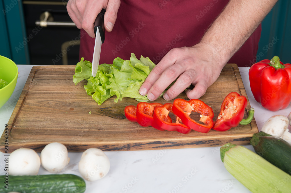 Be careful with knife. Chef teaches how quickly chop vegetables. Chop food safely and efficiently, ensure that you use the right tools. Learn how hold knife correctly and use right chopping technique Be careful with knife. Chef teaches how quickly chop vegetables. Chop food safely and efficiently, ensure that you use the right tools. Learn how hold knife correctly and use right chopping technique