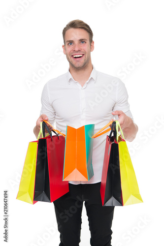 Shopping list. People overspend or buy things they not want, not need because they have not prepared properly. Guy happy shopped with list bought exactly what he needs. Man carry shopping bag