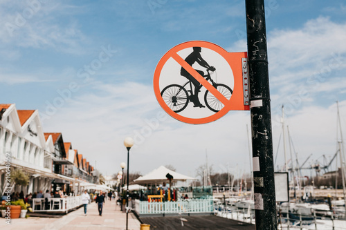 A sign prohibiting the movement of bicycles along a pedestrian street in Lisbon in Portugal