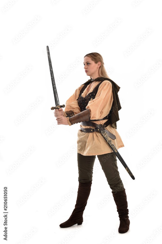 full length portrait of girl wearing brown medieval costume,. standing pose, isolated on white studio background. full length portrait of girl wearing brown medieval costume,. standing pose, isolated on white studio background.