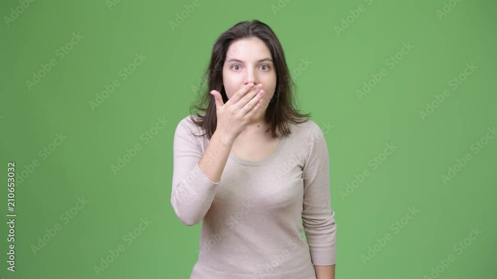 Young beautiful woman looking shocked Young beautiful woman looking shocked