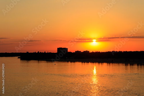 Orange sunset over a river Dnieper in Kremenchug city  Ukraine