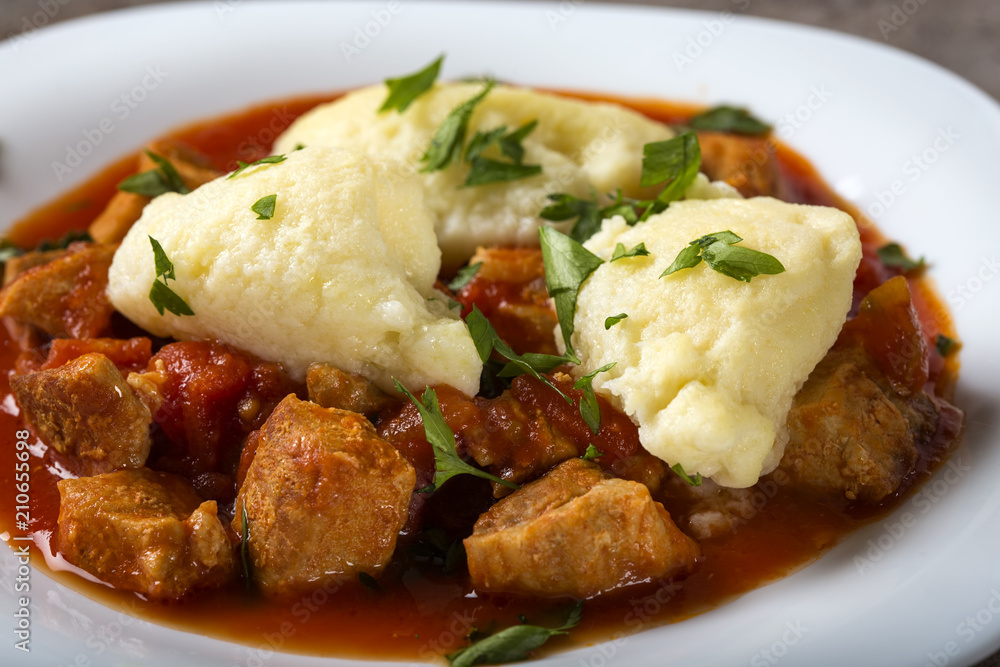 Traditional Hungarian food: Goulash with dumplings Traditional Hungarian food: Goulash with dumplings