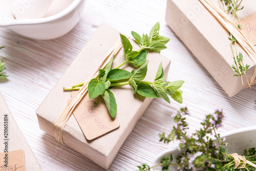 Gift box decorated with oregano leaves