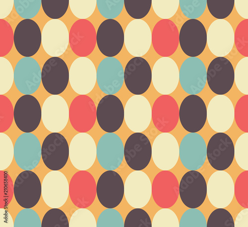 Seamless patter made of retro colored oval abstract geometry shapes in vintage colors of blue, tan, brown on orange background, Easter egg imitation