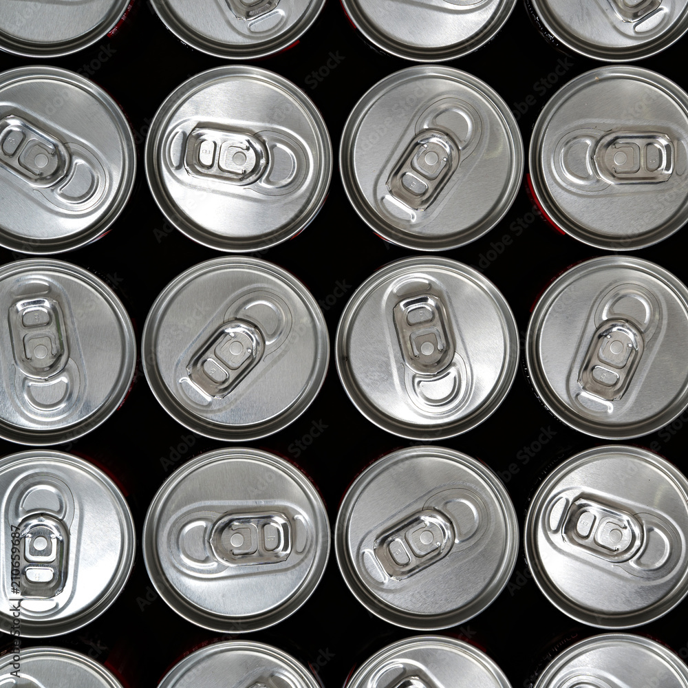Top view, aluminium cans with a drink Top view, aluminium cans with a drink