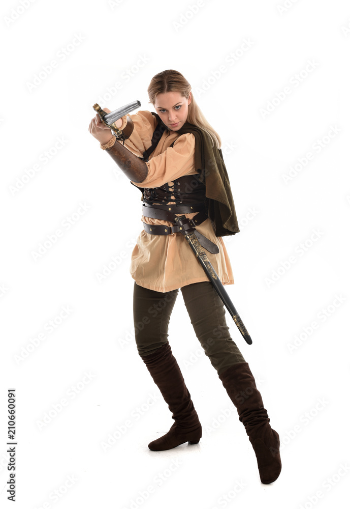 full length portrait of girl wearing brown medieval costume,. standing pose, isolated on white studio background. full length portrait of girl wearing brown medieval costume,. standing pose, isolated on white studio background.