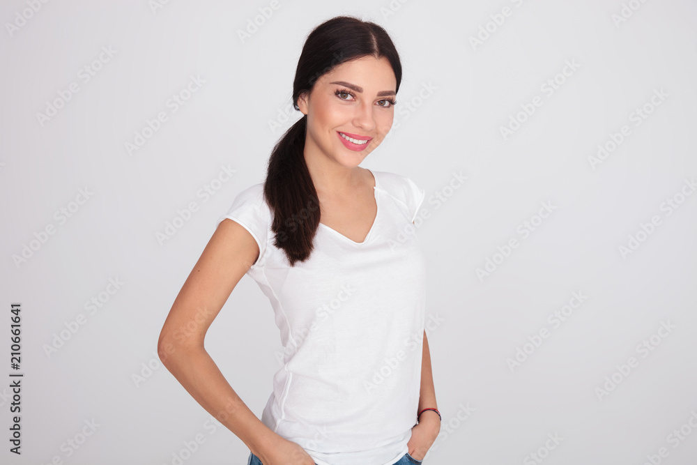 portrait of relaxed brunette woman in white t-shirt portrait of relaxed brunette woman in white t-shirt
