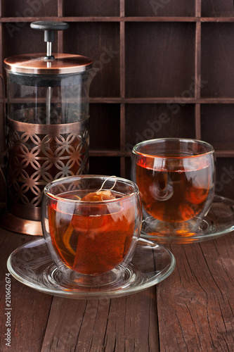 Still life with tea cup on wooden background