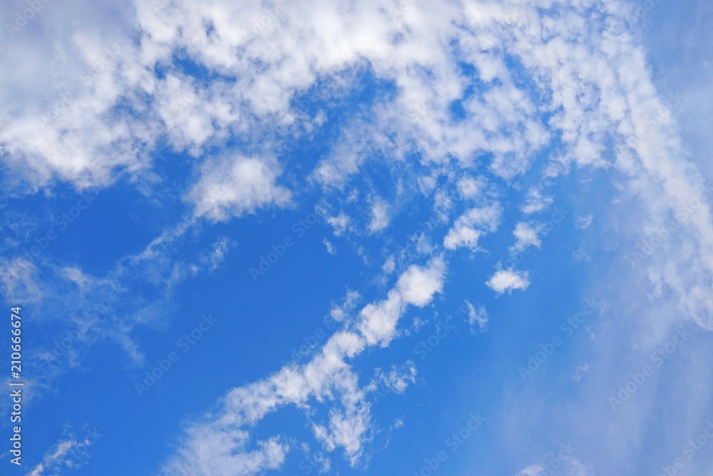 Beautiful nature of blue sky and clouds with the sun shining, sky background, cloudscape concept. Space for text in template, Empty, Looking up Beautiful nature of blue sky and clouds with the sun shining, sky background, cloudscape concept. Space for text in template, Empty, Looking up
