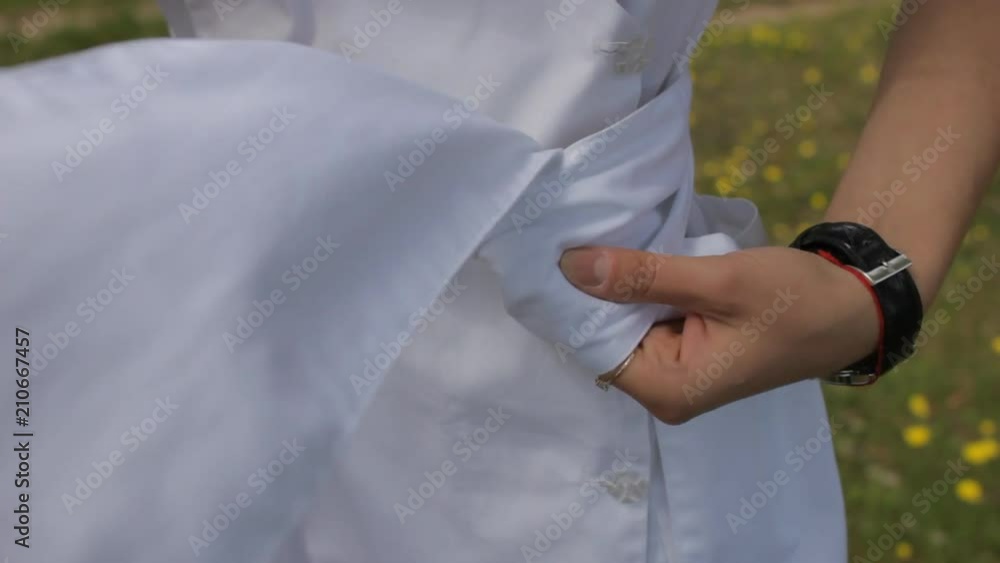 The girl on the nature tie a dress, white dress The girl on the nature tie a dress, white dress