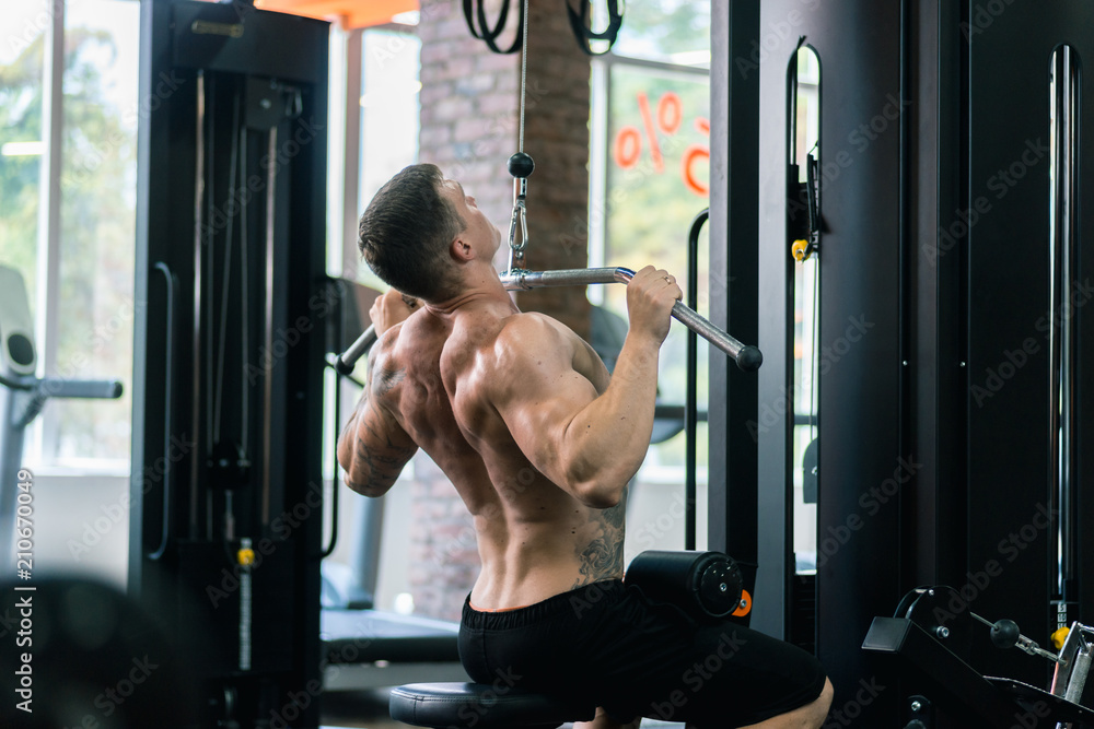 athlete pumps muscles, the concept of healthy eating and lifestyle, love of sports