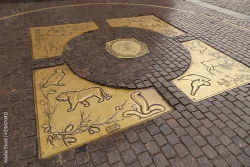 Photography A Horoscope sign on the cobble stone floor on one of the entries to the Red Squa