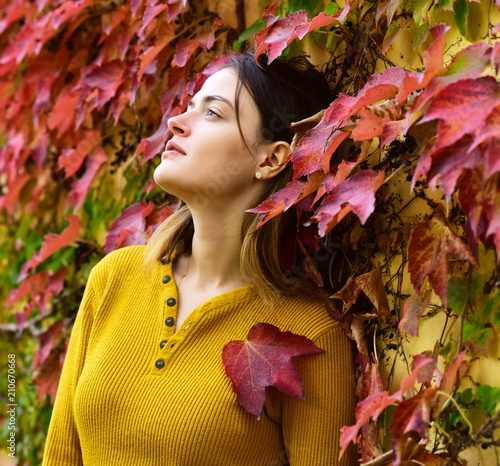 Autumn season and beauty concept. Woman with dreamy face