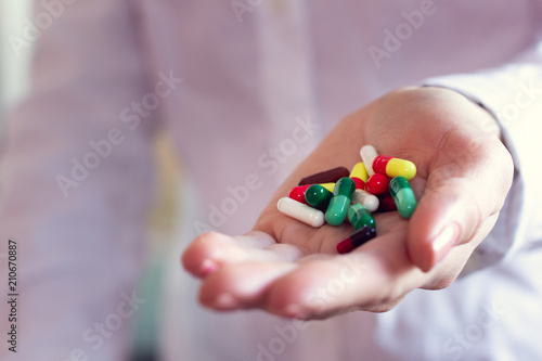 Wallpaper Mural pills capsules in a doctor's hand Torontodigital.ca