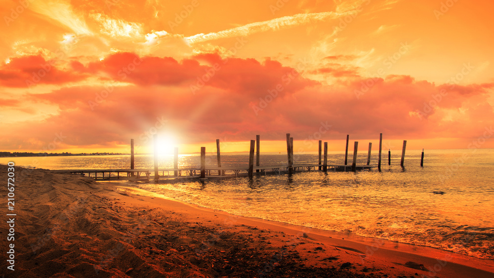 Sunset at golden hour next to Miami Playa, in Montroig. Tarragona beach landscape with empty copy space.