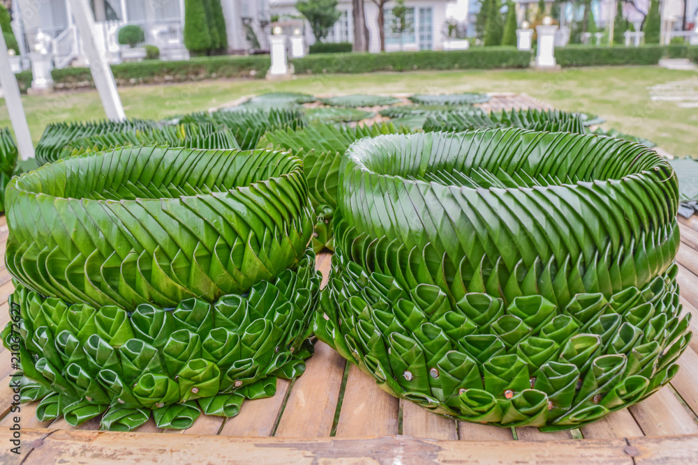 Fototapeta premium Krathong made from banana leaf folded in Thai traditional pattern.