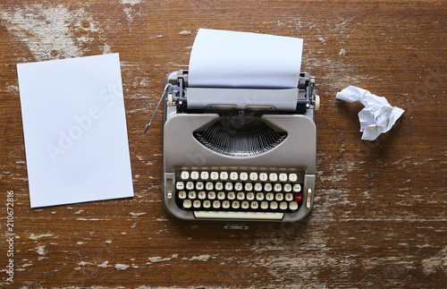 vintage desktop scenery typewriter and paper on vintage wooden table