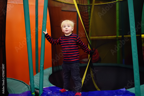 Fanny little boy after activity on trampoline