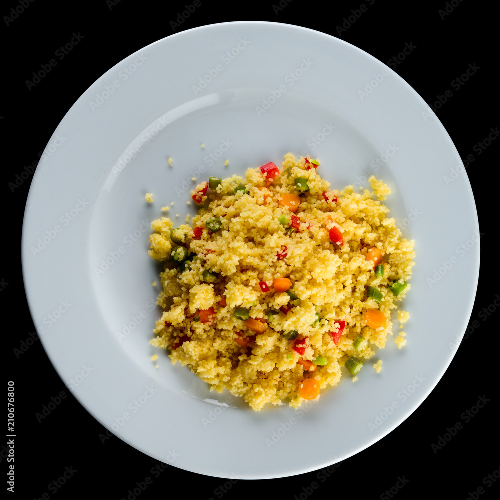 Delicious pilaf with vegetables and herbs in a white plate isola Delicious pilaf with vegetables and herbs in a white plate isola