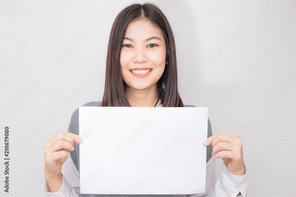 Beautiful asian women hold white blank paper advertising Beautiful asian women hold white blank paper advertising