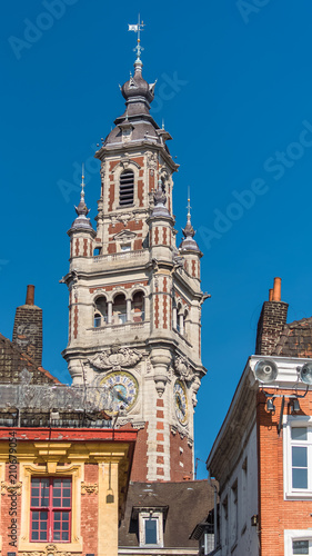 Lille, old facades in the center, the belfry of the Chambre de Commerce in background 