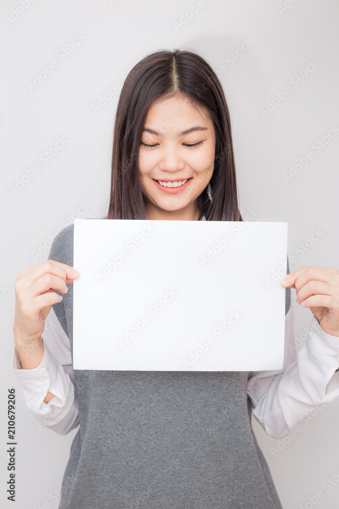 Beautiful asian women hold white blank paper advertising Beautiful asian women hold white blank paper advertising
