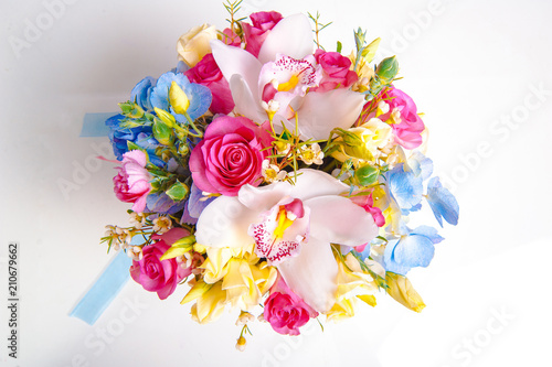 Flower Bouquet from roses, orchids on white background.
