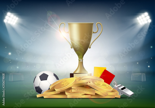 Soccer ball with cup and golden coins on the stadium
