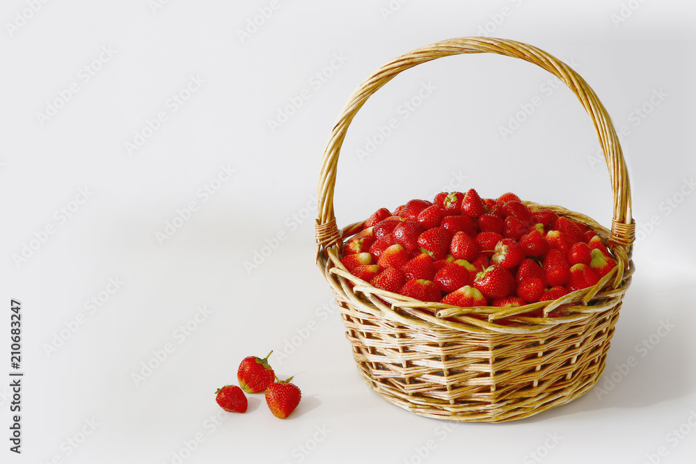 big basket of delicious ripe strawberries on white background big basket of delicious ripe strawberries on white background