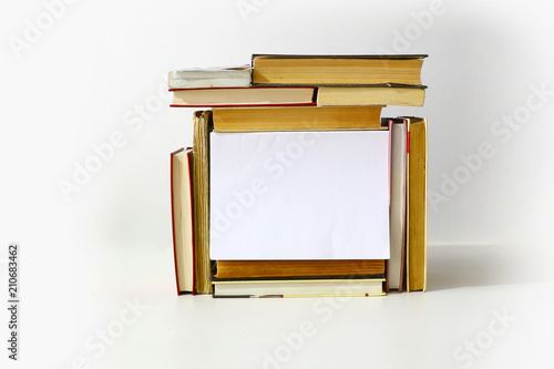 frame for message from a pile of books on a light background