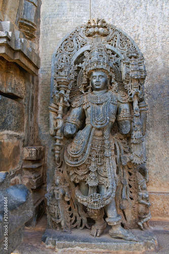 Close up of dwarapala on the left side of the North entrance, Hoysaleshvara Temple, Halebid, Karnataka