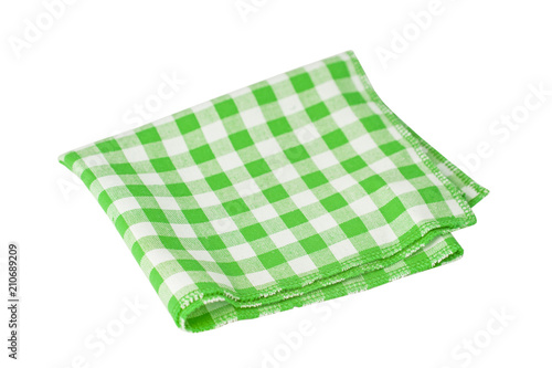 Green tablecloth in a cage isolated on white