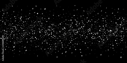 A glitter of silver particles on a black