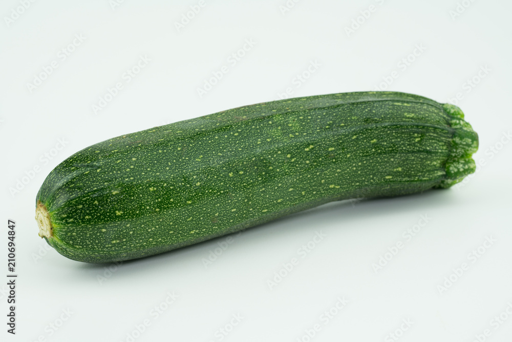 Organic homegrown green zucchini from my farm isolated on white background Organic homegrown green zucchini from my farm isolated on white background