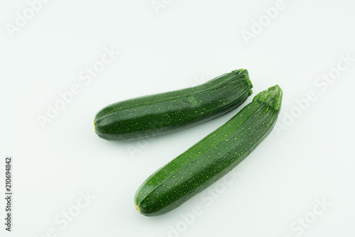 Organic homegrown green zucchini from my farm isolated on white background