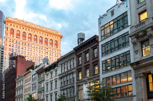 Historic buildings along 23rd Street in Manhattan New York City at dusk