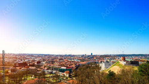 Beautiful spring panorama of Vilnius old town at sunny day in ra