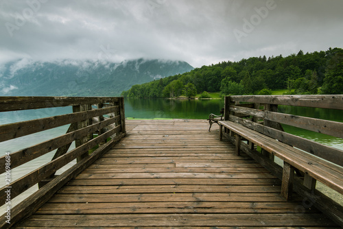 Canvas Print Wooden pier leading into Bohinj Lake, Slovenia