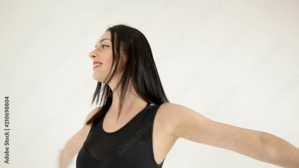 gymnast doing vertical twine in the air gymnast doing vertical twine in the air
