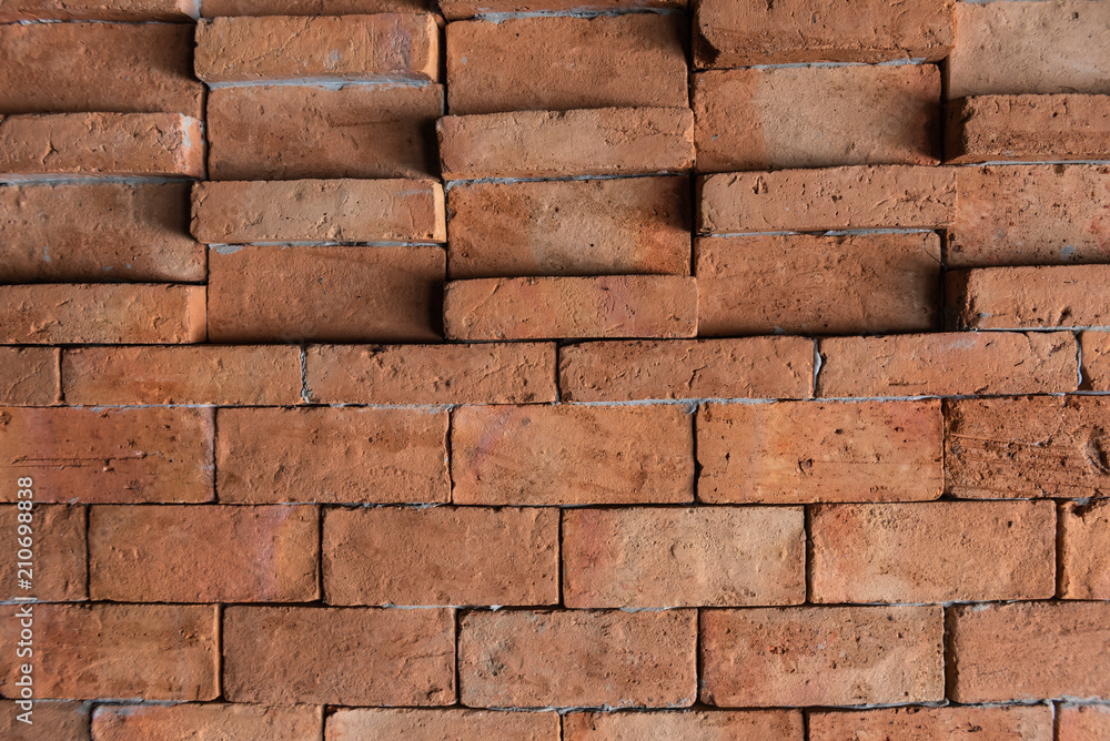 Fototapeta premium Closeup wall texture, Orange Brick wall for pattern and background.