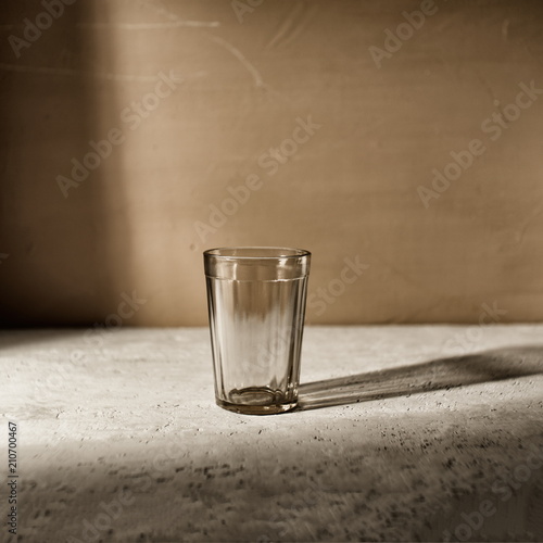 empty glass on a gray background