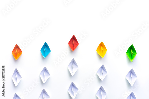 Paper ships on white background, Business competition concept. Free Download Paper ships on white background, Business competition concept. - GFXLoad