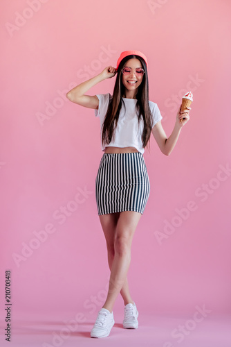 Young girl on pink background