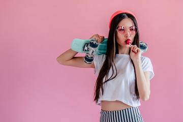 Young girl on pink background