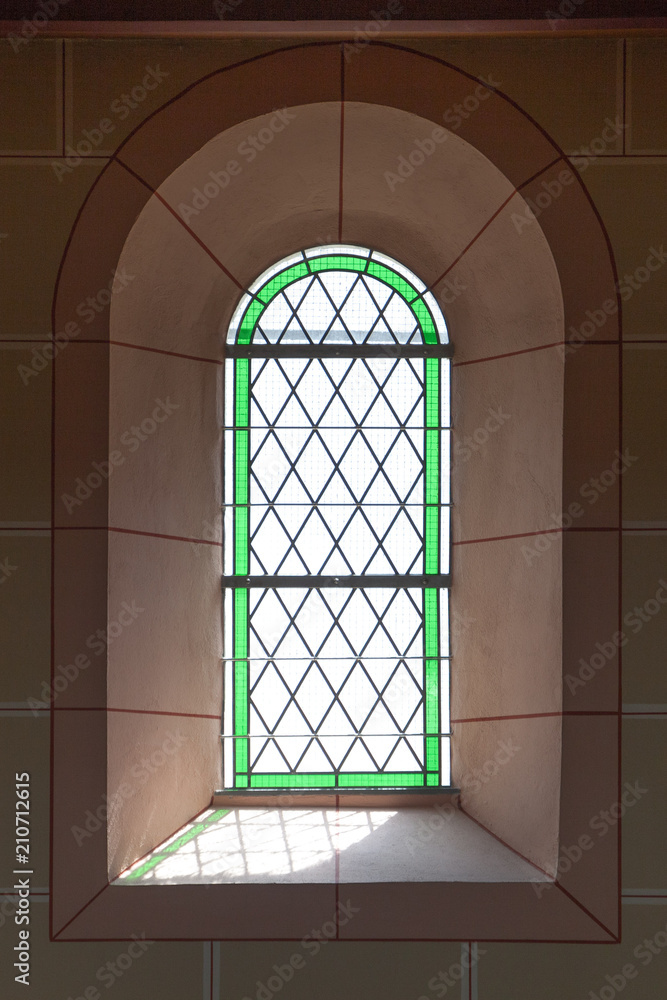 Stained glass window in a church Stained glass window in a church