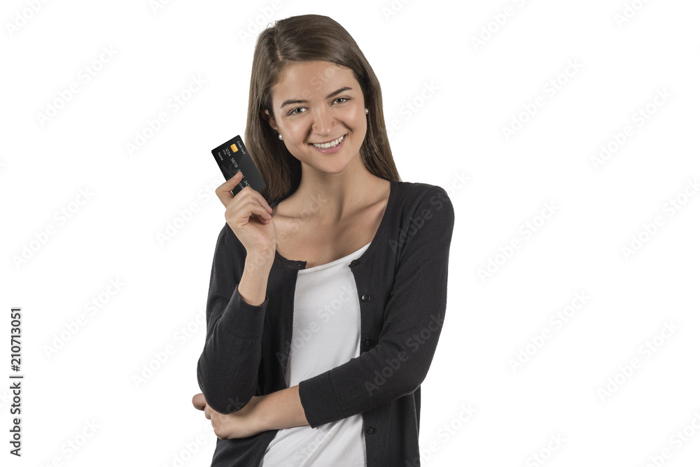 Happy woman holds a credit card in her hand Happy woman holds a credit card in her hand