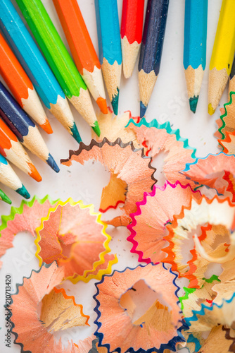 colored pencil shaving on white background. school education concept photo
