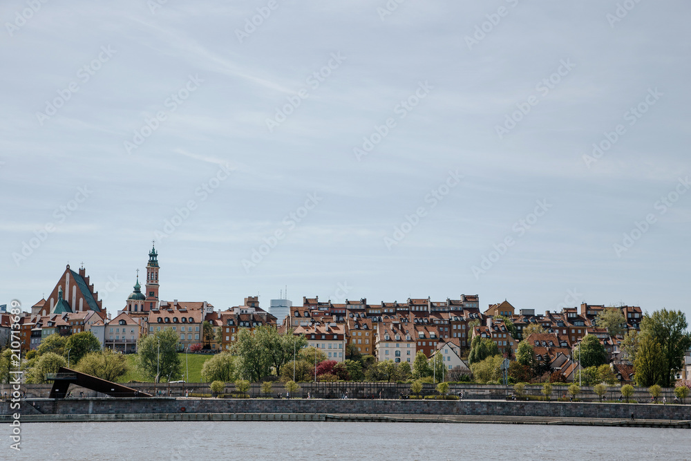 City over the river. Warsaw over the Vistula. The old town is the Polish and Viennese Boulevards. Old and owen parts of the city. Architecture. Temples and churches. High-rise buildings and historic