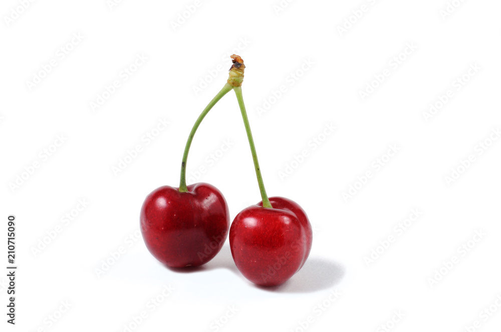 Fruits of a sweet cherry on a white background. Front view. Fruits of a sweet cherry on a white background. Front view.